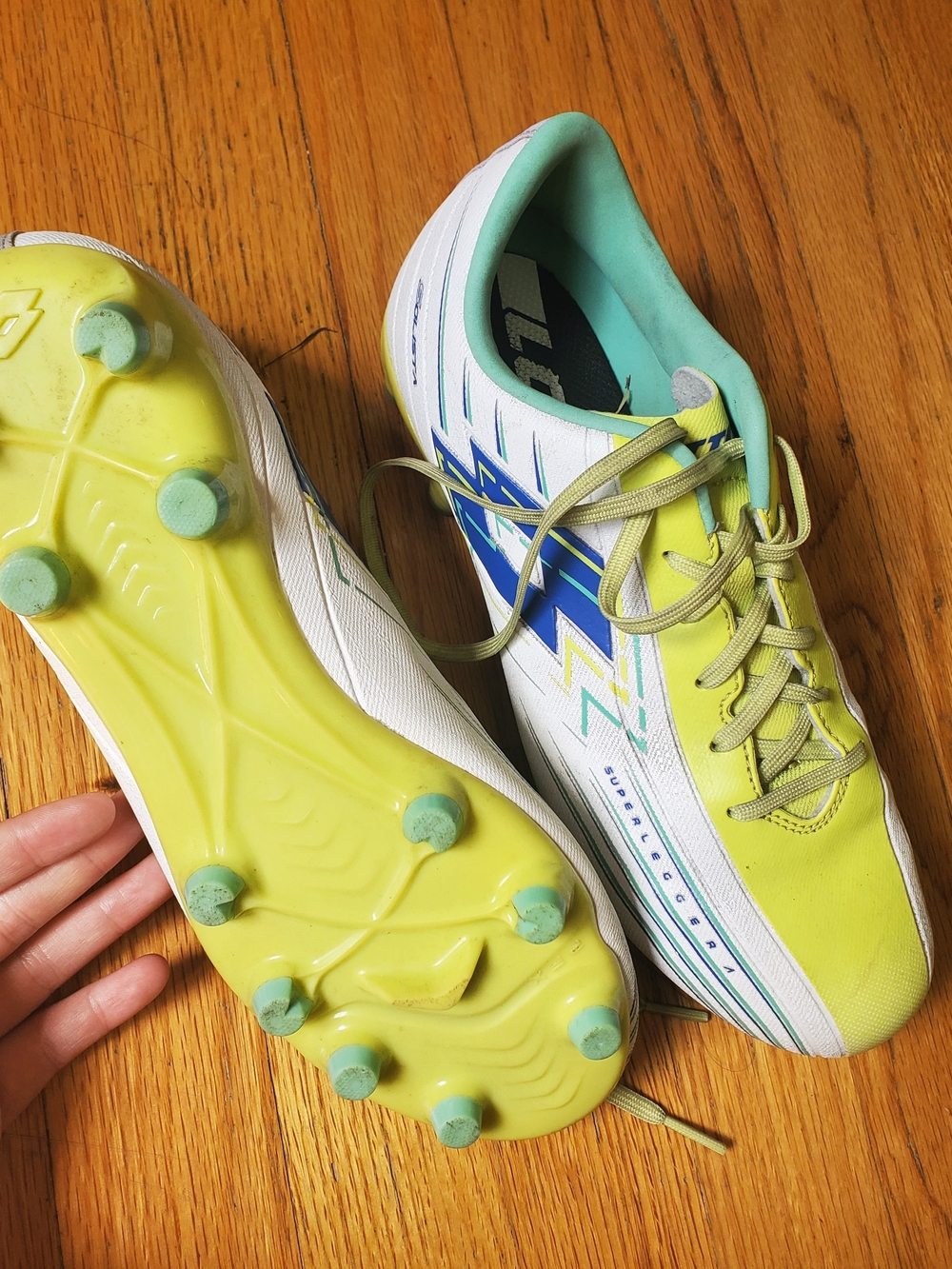 Soccer Cleats in Neon Yellow & White with Blue Accents - Picture 2 of 6